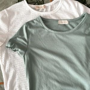 Pack of two alterd state tee shirts. Both size large